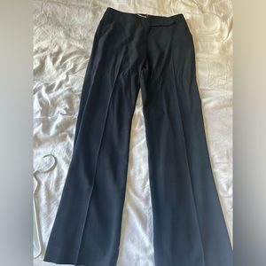 Calvin Klein - navy pleated trousers